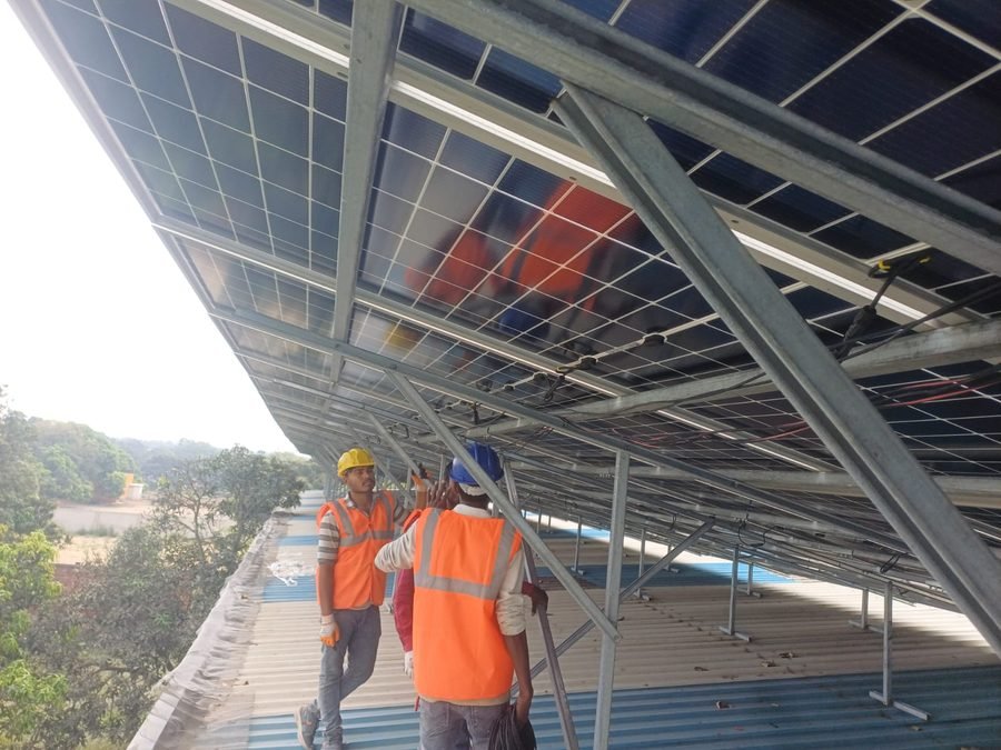 Auctus Resources site team erecting mounting structures at a MW-scale solar project